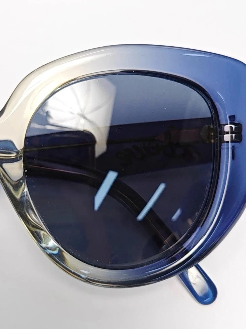 Loewe Blue Round Sunglasses with Gold Logo